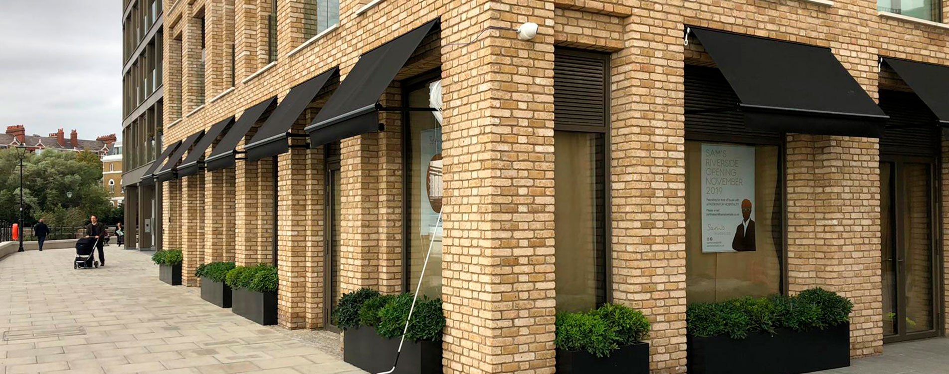 Chelsea Drop Arm Commercial Awnings