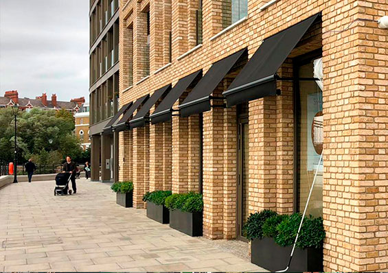 Chelsea Drop Arm Commercial Awnings