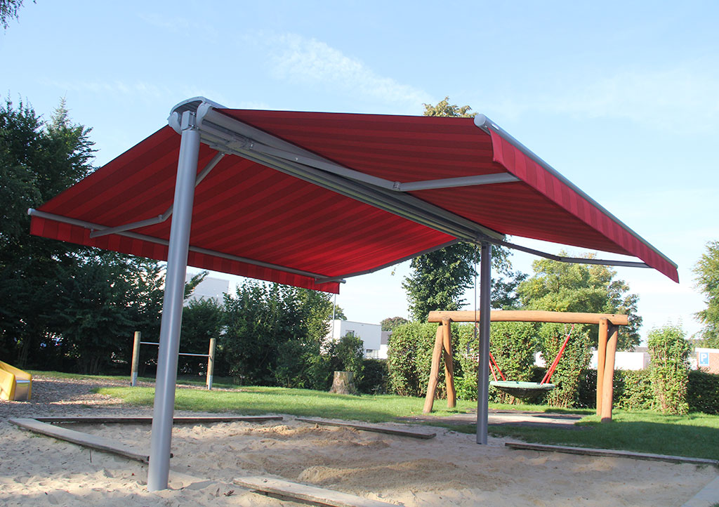 Markilux Syncra awning stand with markilux 1700 awnings - playground shade