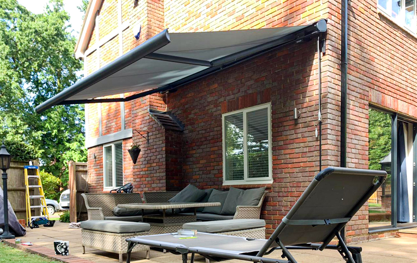 Markilux 6000 Awning Finished in Metallic Anthracite Grey & Installed in Cobham By Our New Malden Branch. 